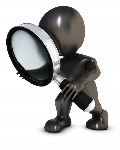 person-seeing-through-a-magnifying-glass_1048-1748